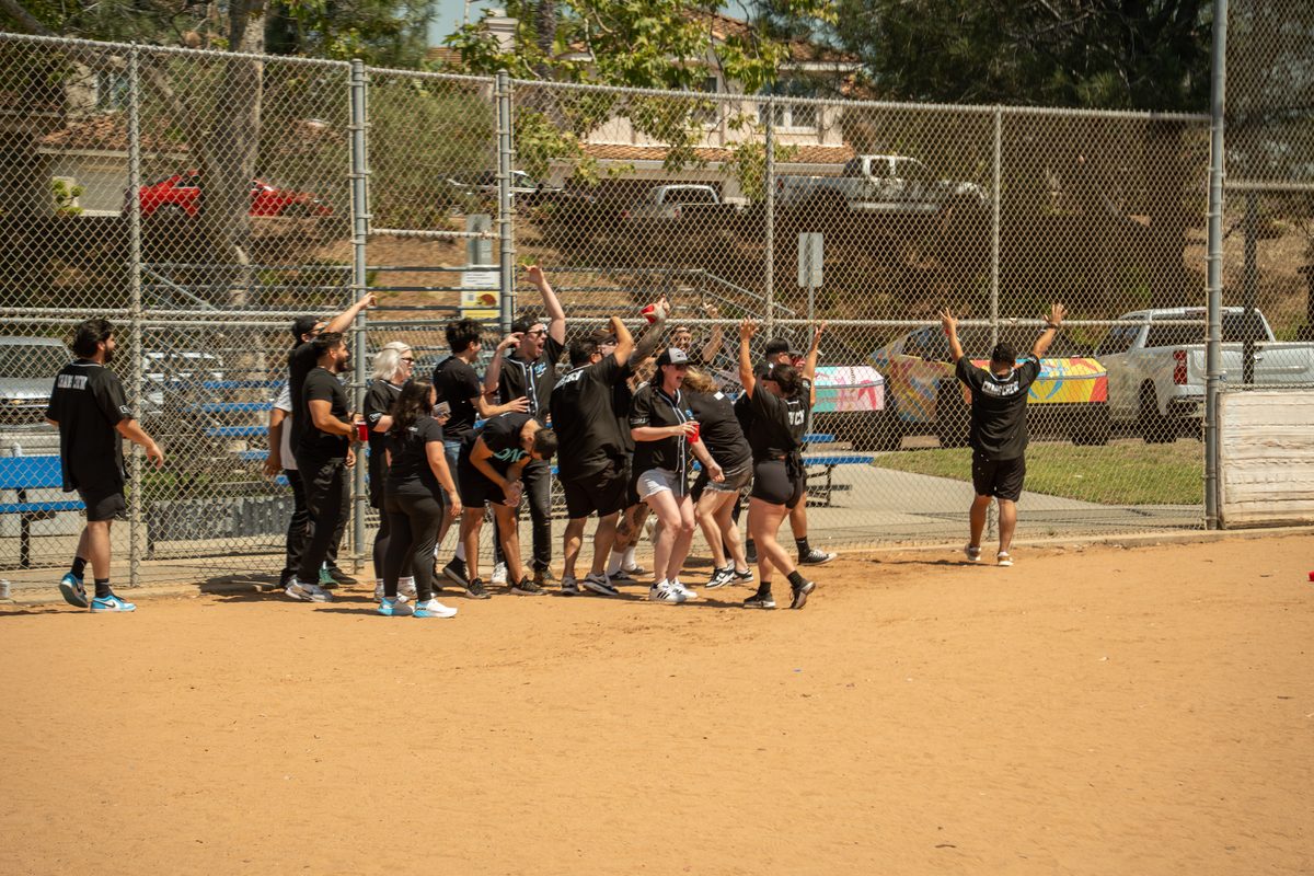 Devin Newcomb with his kickball league team